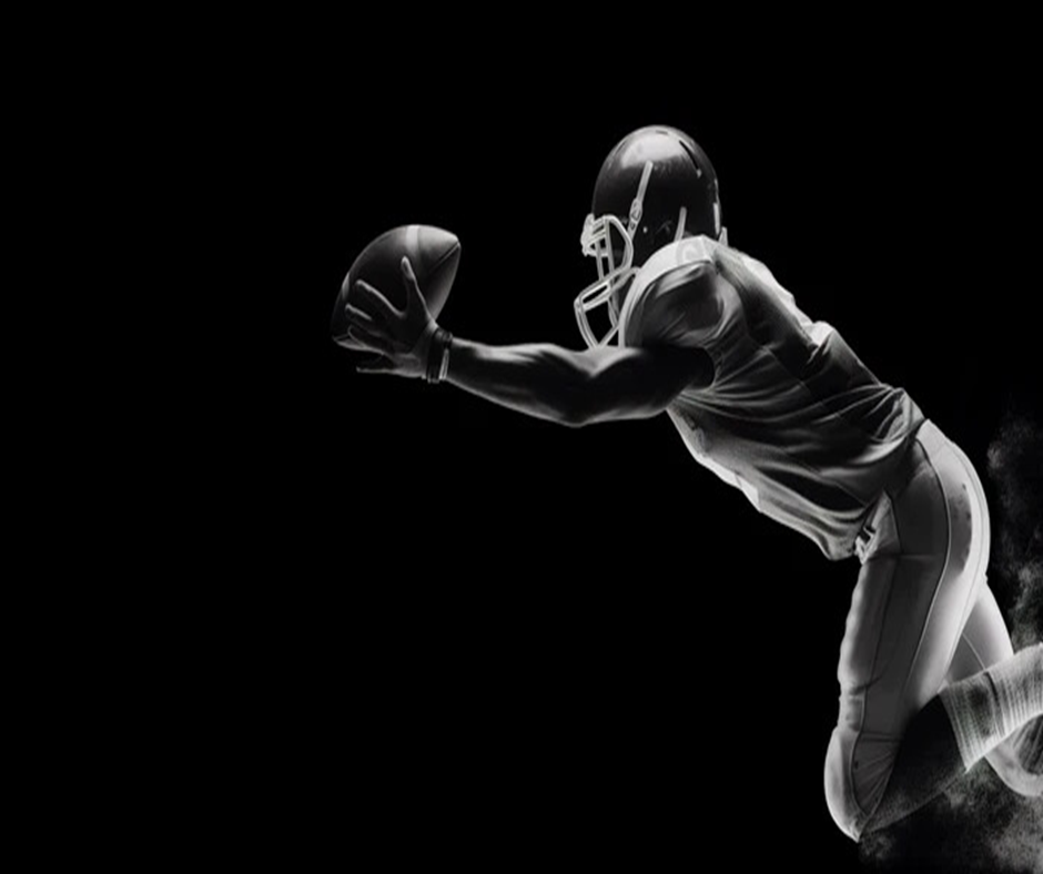 ball players black and white image of an american football player catching the 9577249